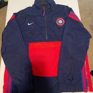 Nike performance pull over . Wind breaker material